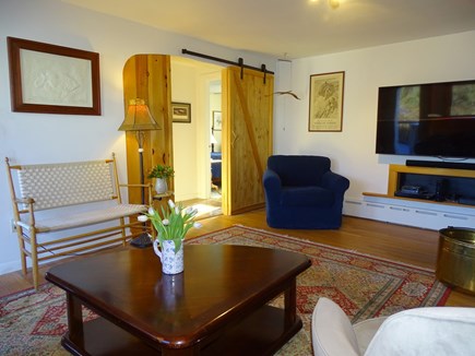 Bourne, Cataumet Cape Cod vacation rental - Living room leading to bathroom and queen bedroom