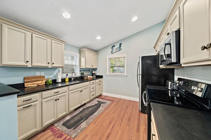 Mashpee Cape Cod vacation rental - Fully renovated kitchen with granite counters & SS appliances