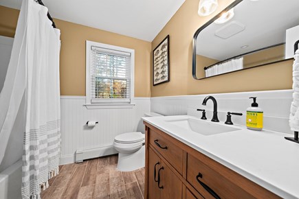 Mashpee Cape Cod vacation rental - Full bathroom - renovated 2022 - tub/shower/towels/hair dryer
