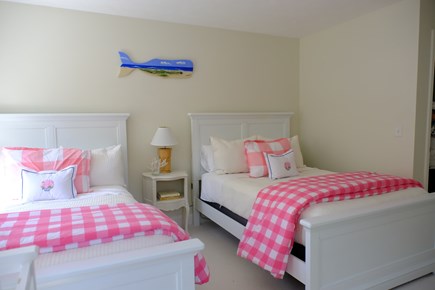 Harwich Cape Cod vacation rental - Second floor bedroom with two double beds and crib
