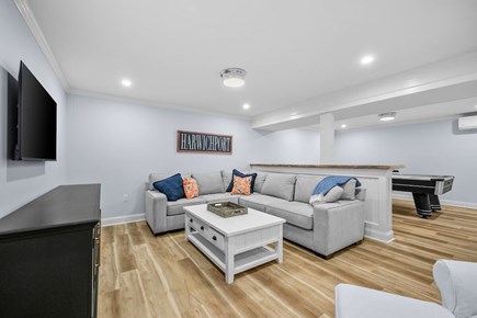 Harwichport Cape Cod vacation rental - Lower level living with kids toys, games and air hockey table