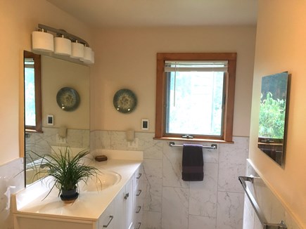 Falmouth Cape Cod vacation rental - Master bathroom vanity area.