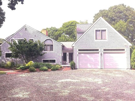 Falmouth Cape Cod vacation rental - Front view of home accessed by a long private driveway.