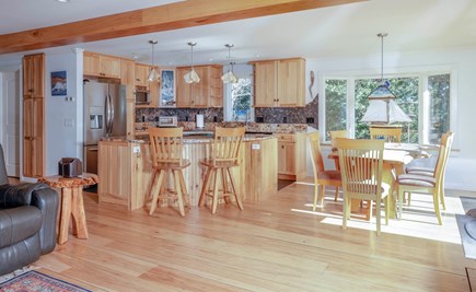 Eastham, The Whole Sha-bang, POOL Cape Cod vacation rental - Main floor kitchen & Livingroom