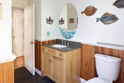 Eastham, The Whole Sha-bang, POOL Cape Cod vacation rental - Downstairs bathroom with access to outdoor shower