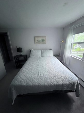 Falmouth Cape Cod vacation rental - Upstairs queen bed. Spacious bedroom with window AC.