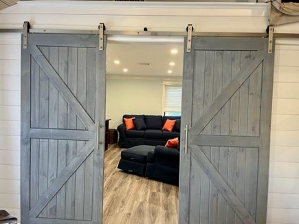 Cotuit Cape Cod vacation rental - Double barn doors to living space/bedroom
