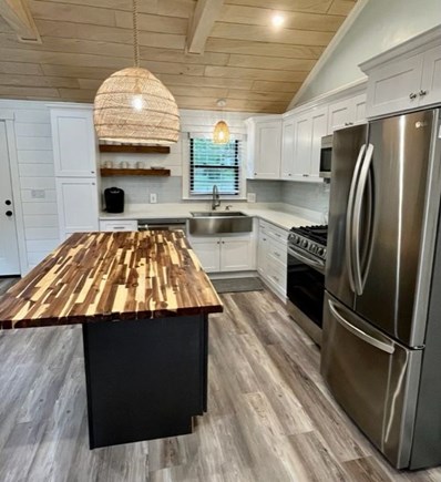 Cotuit Cape Cod vacation rental - Large butcher block with 4 stools for entertaining.
