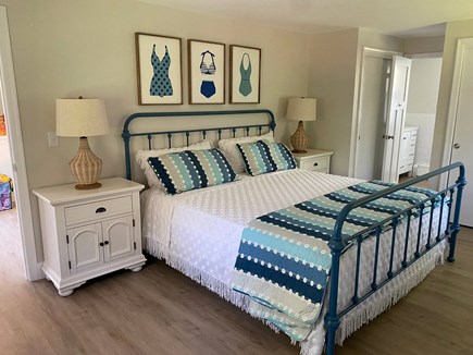 Centerville Cape Cod vacation rental - Primary bedroom with ensuite in background