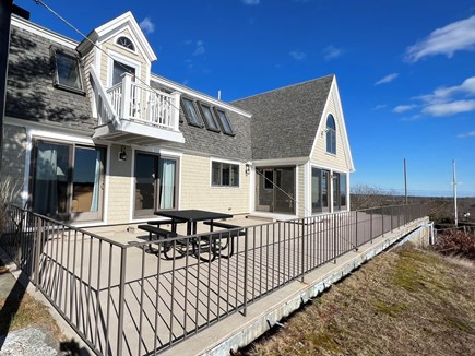 Bourne Cape Cod vacation rental - A backside view of the home showing the upper deck.