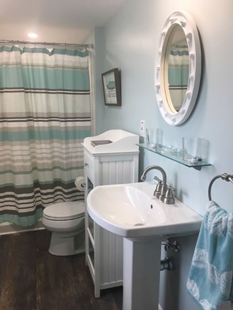 West Dennis Cape Cod vacation rental - Private master bath with 5 ft shower, pedestal sink and storage