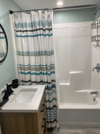 West Yarmouth Cape Cod vacation rental - New bathroom with tub and washer/dryer