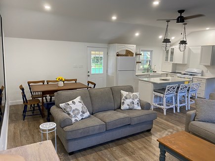 West Yarmouth Cape Cod vacation rental - Table for dining or board games, couches and TV for relaxing