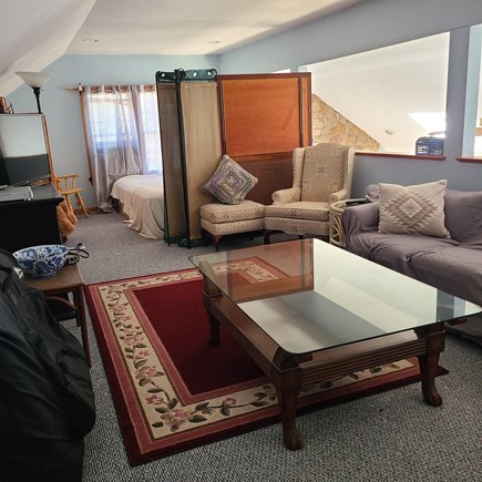 Brewster Cape Cod vacation rental - Upper loft area with sitting area, fireplace and TV