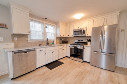 Dennis Cape Cod vacation rental - Fully stocked kitchen with cooking supplies, Keurig, and toaster