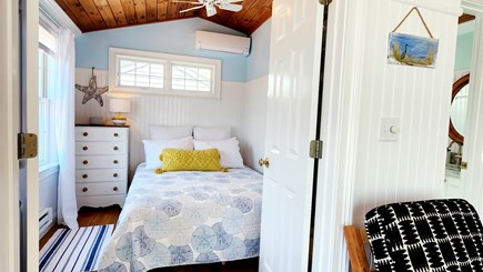 Yarmouth Cape Cod vacation rental - 1 queen bed , artisan hand painted dresser + TV in bedroom.