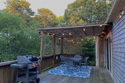 Centerville Cape Cod vacation rental - Large deck with gas grill, pergola and string lights