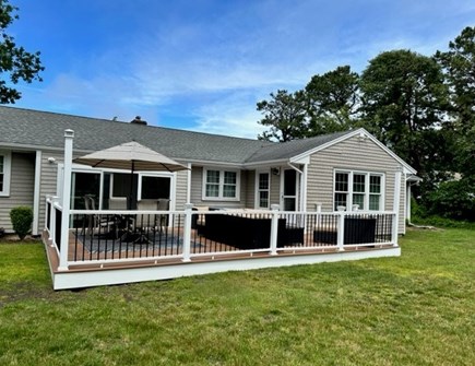 Dennis Cape Cod vacation rental - Backyard with large deck