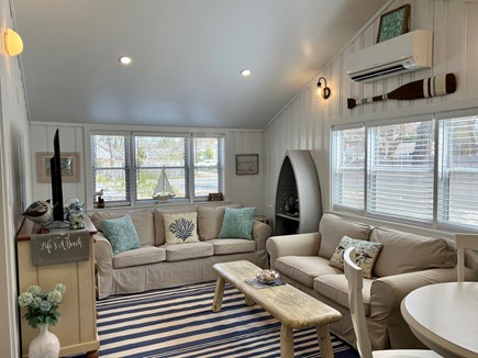 Dennis Cape Cod vacation rental - Coastal living room with smart TV and comfy loveseat and sofa!