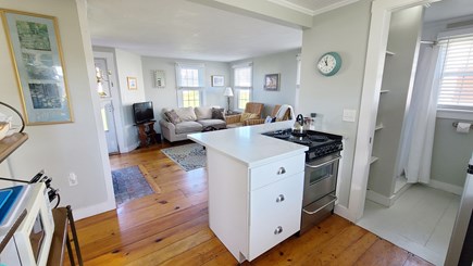 Truro Cape Cod vacation rental - Kitchen with counter seating is open to living room