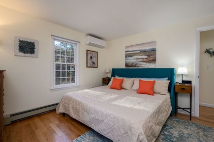Eastham Cape Cod vacation rental - First floor King bedroom with soothing hues of ocean blue and beach life artwork