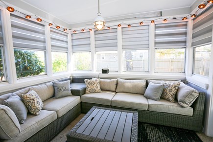 West Dennis Cape Cod vacation rental - Screened in porch with party lights