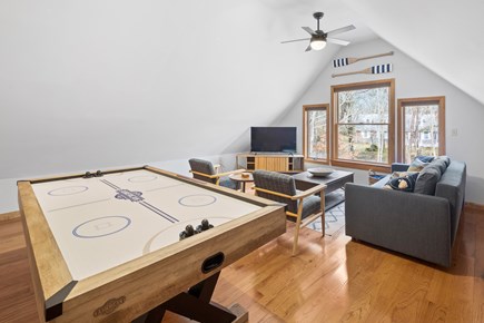 Eastham Cape Cod vacation rental - Bonus room with air hockey table, plenty of seating and