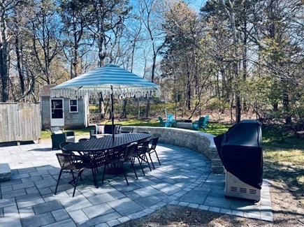 Eastham Cape Cod vacation rental - New patio with seating, dining table and outdoor shower