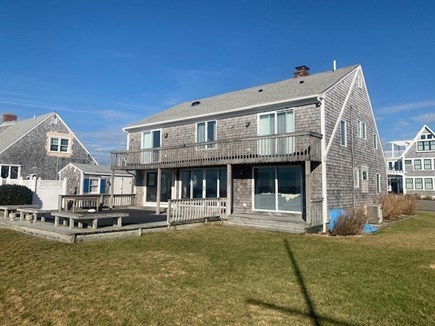 West Dennis Cape Cod vacation rental - Large deck and Yard to water