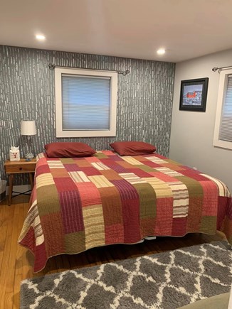 East Falmouth Cape Cod vacation rental - King bed in the primary bedroom.