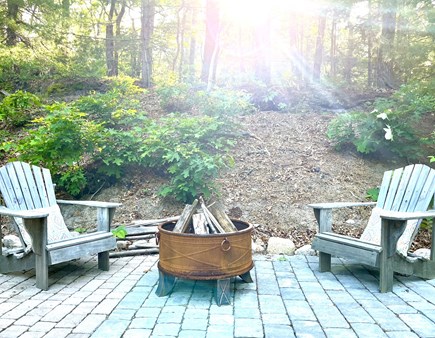 East Falmouth Cape Cod vacation rental - Fire pit lounge with Adirondack chairs