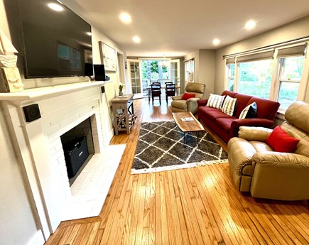 East Falmouth Cape Cod vacation rental - Living room to dining area to deck