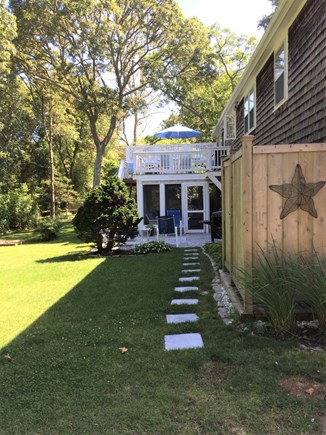 Harwich Cape Cod vacation rental - View Towards Screened in Porch with Flat Screen T.V.