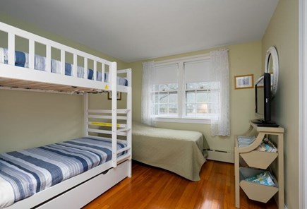 Centerville Cape Cod vacation rental - Bunk room with four twin beds and flat screen TV