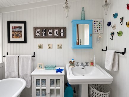 North Eastham Cape Cod vacation rental - Classic cottage water closet with an artistic flare.