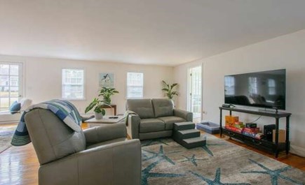 Sagamore Beach Cape Cod vacation rental - Living room with tons of seating and games