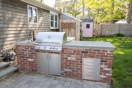South Dennis Cape Cod vacation rental - OUTDOOR KITCHEN -GRILL HAS PIPED NATURAL GAS AND  SINK