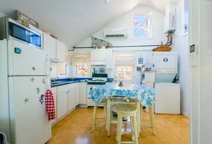 Sagamore Beach Cape Cod vacation rental - Seating for 4 guests and washer & dryer available in the kitchen