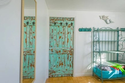 Sagamore Beach Cape Cod vacation rental - Bedroom with queen bed and vintage accent door