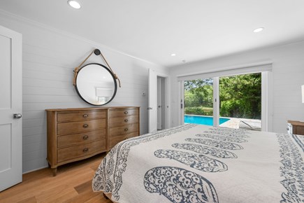 Centerville Cape Cod vacation rental - Bedroom 1: King Bed w/ ensuite bathroom and slider to pool- 1st Floor