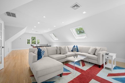 Centerville Cape Cod vacation rental - Ping pong in game room behind sectional