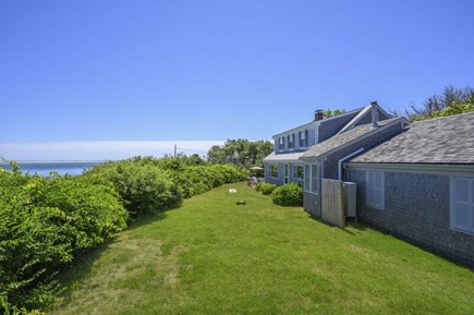 North Chatham Cape Cod vacation rental - A full view of the home and backyard overlooking the ocean