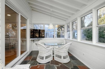 West Harwich Cape Cod vacation rental - Sunroom dining and lounge areas along with a flat screen TV