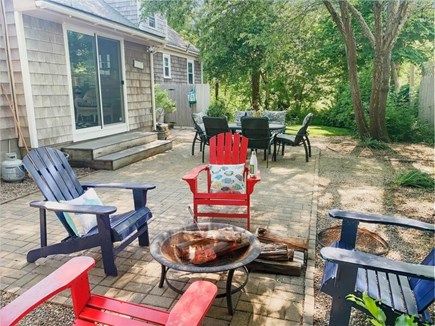 Hyannis Cape Cod vacation rental - Firepit and backyard dining