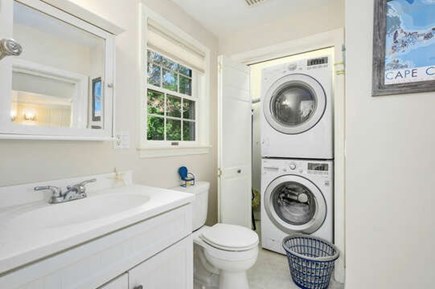 Harwich Port Cape Cod vacation rental - Front loading washer and dryer in half bath
