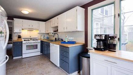 Harwich Cape Cod vacation rental - Bright open kitchen with access to outdoors, dining & living area