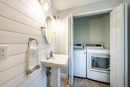 Sandwich Cape Cod vacation rental - Downstairs half bathroom with full washer & dryer.