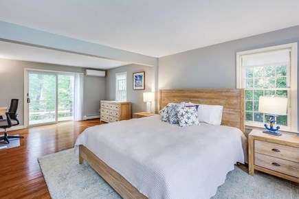 Brewster Cape Cod vacation rental - Expansive King master bedroom, including reading nook and desk.