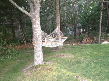Dennis Cape Cod vacation rental - Private backyard with hammock and a dog runner