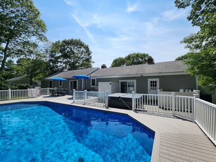 Osterville Cape Cod vacation rental - Back yard oasis with heated pool, outdoor shower, hot tub & more!